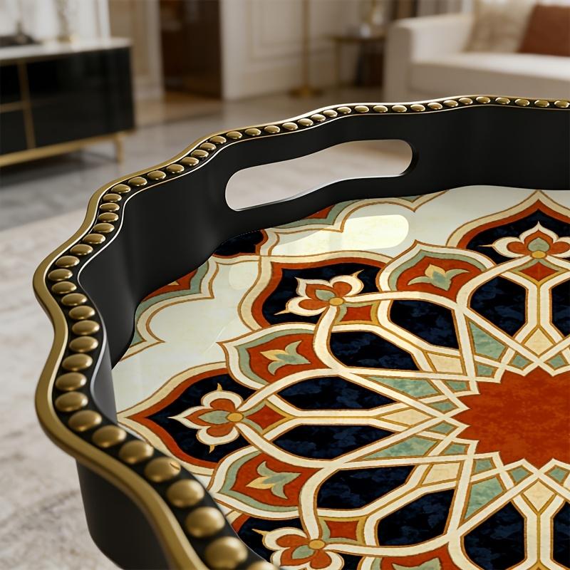 Un table d'appoint polygonal avec un motif étoile à rayons noir et rouge, présentant un design géométrique radial avec un centre rouge, émettant une ambiance mystérieuse et atmosphérique, idéal pour un décor marocain.Ouvrir dans un nouvel o